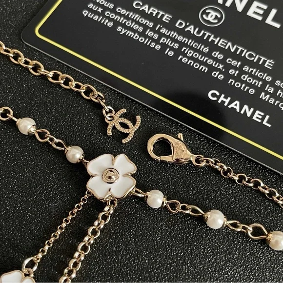 CHANEL Gold and White Floral Necklace - Picture 4 of 9